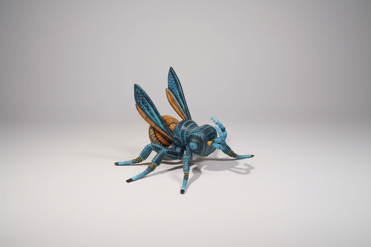 Hand-carved Oaxacan alebrije bug figurine, vibrant Mexican folk art made in Oaxaca Mexico